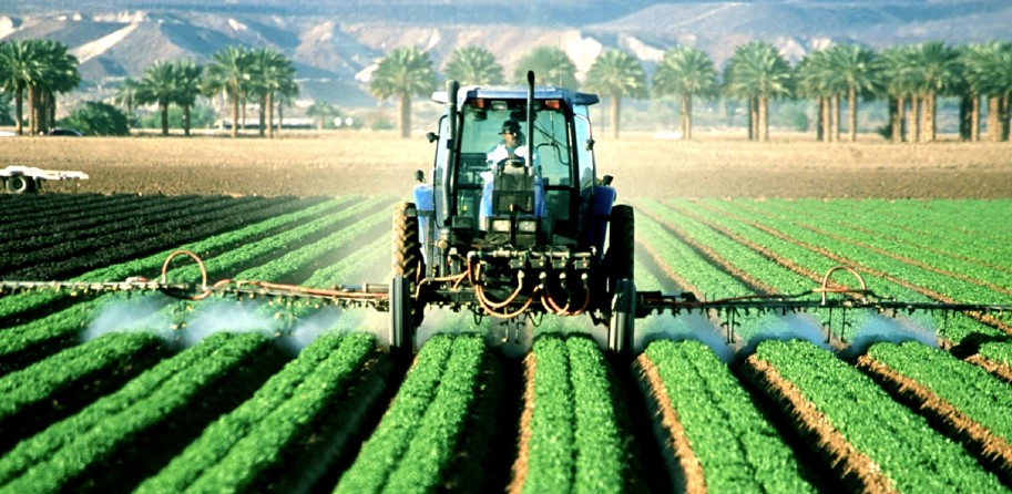 tractor spraying pesticides