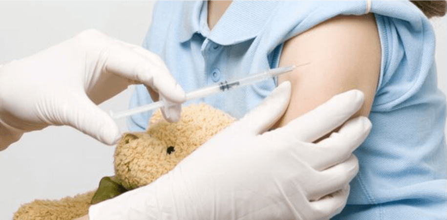 kid getting injection of medication